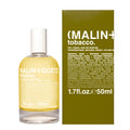 A bottle of Malin + Goetz Tobacco Eau de Parfum next to its olive green outer box, featuring the brand name 'MALIN + TOBACCO' in white text on the packaging.